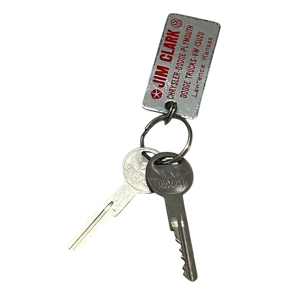Vintage Jim Clark Chrysler Plymouth Dodge VW Isuzu Key Fob Lawrence KS Metal Tag